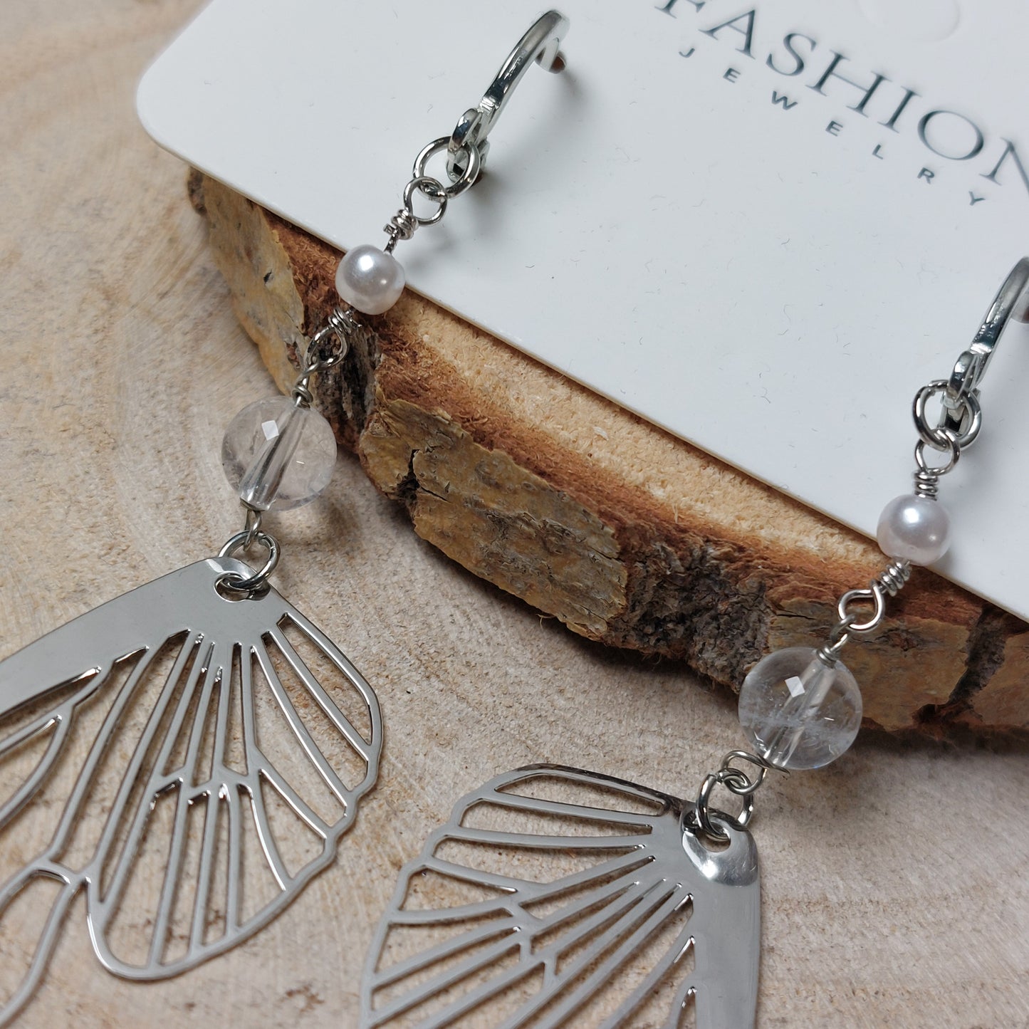 Modeschmuck Ohrringe Bergkristall Flügel