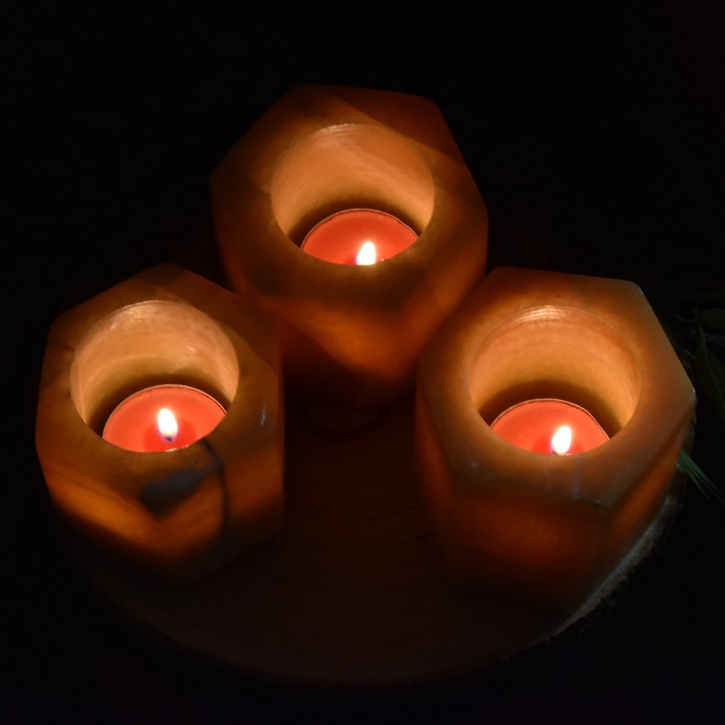 Orangencalcit Teelichthalter